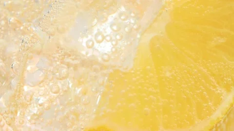 Refreshing soft cold lemonade mojito drink with slices of lemon and sparkling Stock Footage 148170533