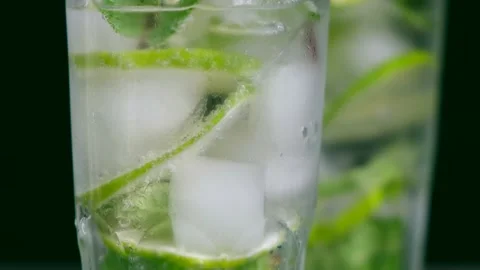 A refreshing soft drink. Mojito in a glass close-up. Stock Footage 154631326