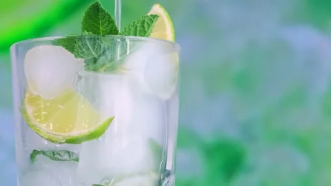 A refreshing soft drink. Mojito in a glass close-up. Stock Footage 154631624