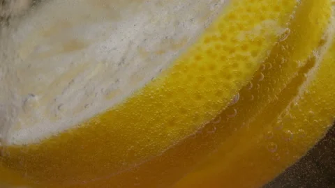 Refreshing soft lemonade mojito drink with slices of lemon and sparkling water. Stock Footage 142276178