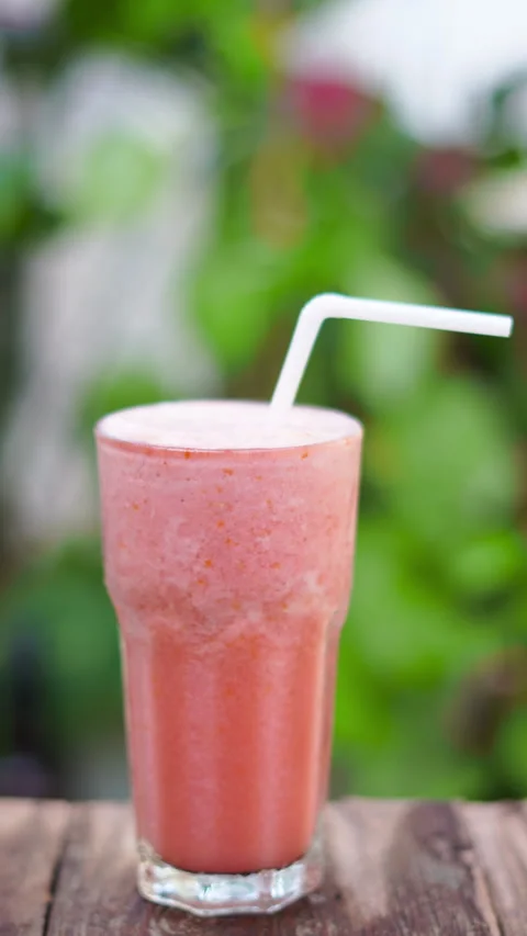 Refreshing strawberry smoothie with mint leaves Stock Footage 263324672