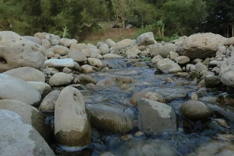 Refreshing Stream Through Rocky Terrain Stock Photos