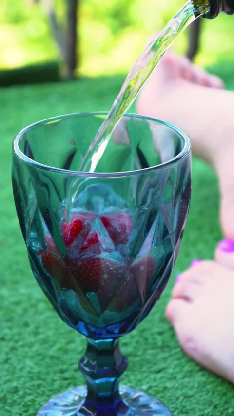 Refreshing Summer Drink with Strawberries Vertical Stock Footage 262983277
