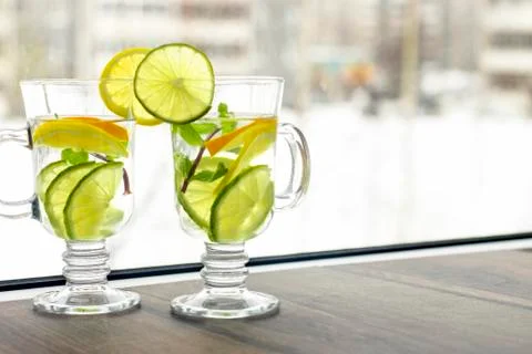 Refreshing summer lemonade with lemon, lime and mint in winter day Stock-Fotos