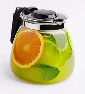 Refreshing tea with lime and orange and mint Stock Photos