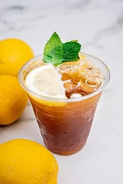 Refreshing tonic with ice and a slice of lemon. Stock Photos