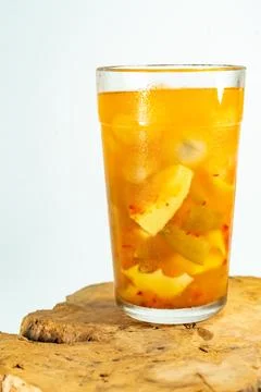 Refreshing tropical fruit pickle featuring sliced young mango, bilimbi, and l Stock Photos