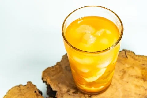 Refreshing tropical fruit pickle featuring sliced young mango, bilimbi, and l Stock Photos