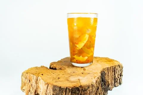 Refreshing tropical fruit pickle featuring sliced young mango, bilimbi, and l Stock Photos