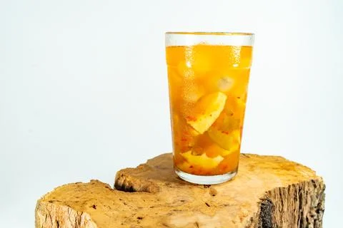 Refreshing tropical fruit pickle featuring sliced young mango, bilimbi, and l Stock Photos