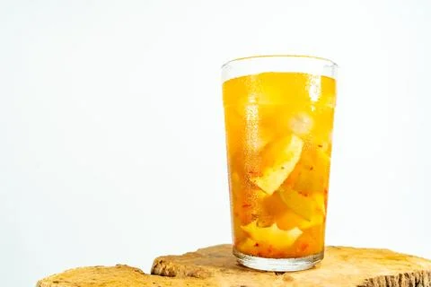 Refreshing tropical fruit pickle featuring sliced young mango, bilimbi, and l Stock Photos