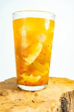 Refreshing tropical fruit pickle featuring sliced young mango, bilimbi, and l Stock Photos