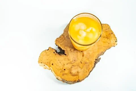Refreshing tropical fruit pickle featuring sliced young mango, bilimbi, and l Stock Photos