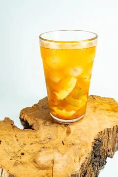 Refreshing tropical fruit pickle featuring sliced young mango, bilimbi, and l Stock Photos