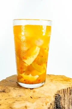 Refreshing tropical fruit pickle featuring sliced young mango, bilimbi, and l Stock Photos