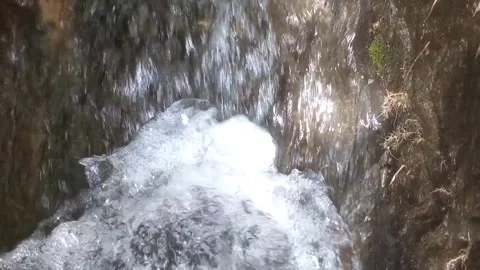 Refreshing Tropical Waterfall Flowing Through Rocky Stream 库存影片 335061881