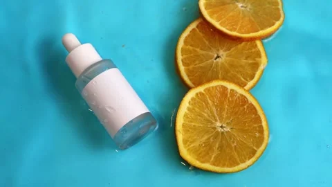 Refreshing Vitamin C Serum with Orange Slices Stock Footage 273765809