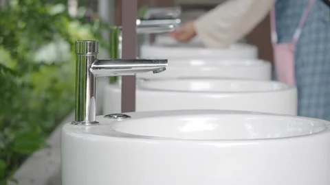 Refreshing water flows at a peaceful outdoor setting Stock Footage 339048618