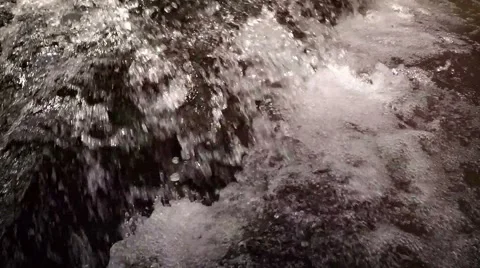 Refreshing Waterfall Cascades into Foamy Pool. Video 1920x1080 Stock Footage 60577981