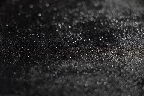 Refreshing wet looking dew pattern of water drops. Close up of pooling beads of  Stock Photos