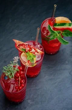 Refreshing wild berry, pomegranate, watermelon lemonade in transparent glasses. Foto stock