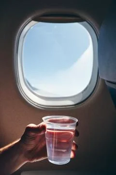 Refreshment during flight Stock Photos