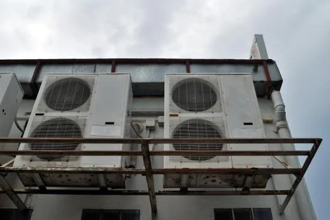 Refrigeration compressor behind the office Stock Photos