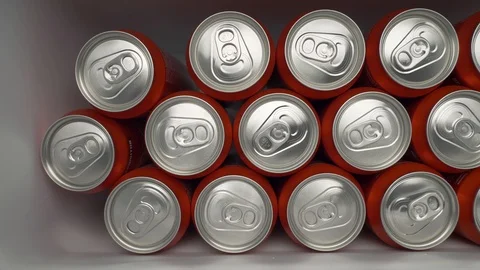 Refrigerator clogged with red cans of soda or beer Stock Footage 106046672