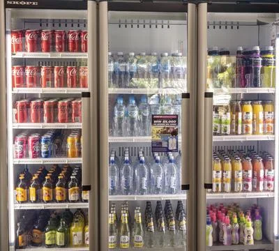 A Refrigerator Full Of Cold Drinks Stock Photos