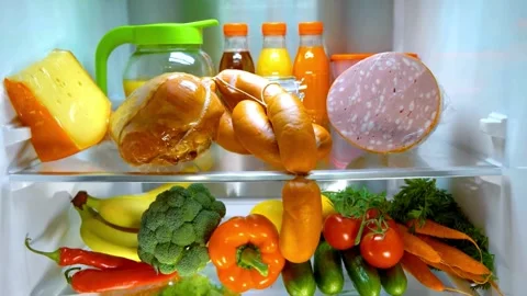 Refrigerator Interior with Various Food Items, Including Sausage and Cold Cuts Stock-Footage 308632151