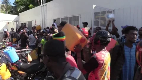 Refueling becomes a risky activity in Port-au-Prince, Port-au-Prince, HT - 05 No Stock Footage 204069867