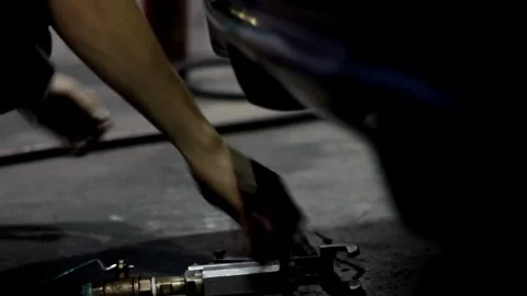 Refueling car fuel tank on gas station, hand holding nozzle, side closeup A.. Stock Footage 256721553