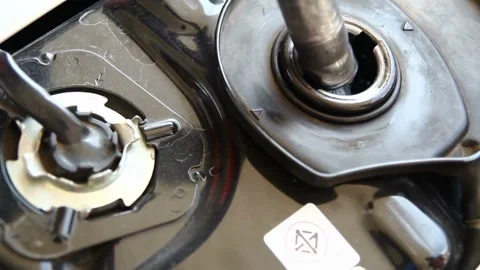 Refueling Car at Gas Station Pump in a Sunny Day Hand refilling the car with 库存影片 336569645