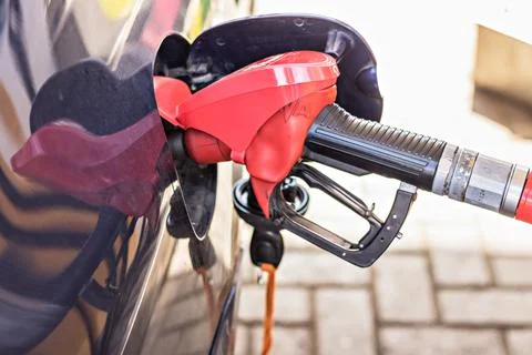 Refueling with gasoline using a gasoline pump car at a gas station Stock Photos