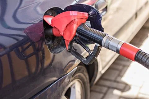 Refueling with gasoline using a gasoline pump car at a gas station Stock Photos