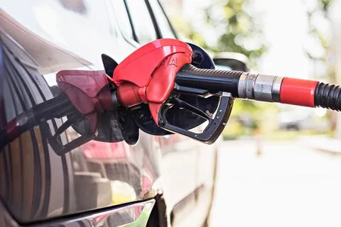 Refueling with gasoline using a gasoline pump car at a gas station Stock Photos