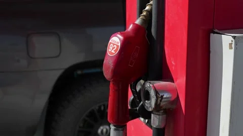 Refueling for a journey: a close-up of a gas pump at a remote station in Stock Footage 317675535