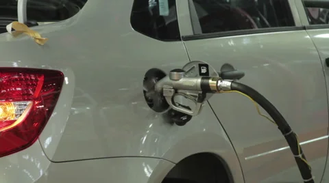 Refueling nozzle in the tank Stock Footage 48619250