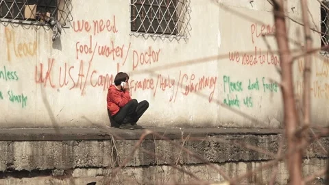 A refugee is calling home Stock Footage 178043838