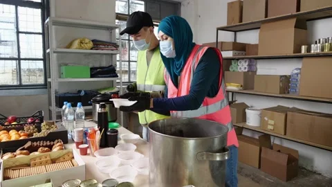 Refugee Community Kitchen serves hot, nourishing meals to displaced people 스톡 동영상 235644736