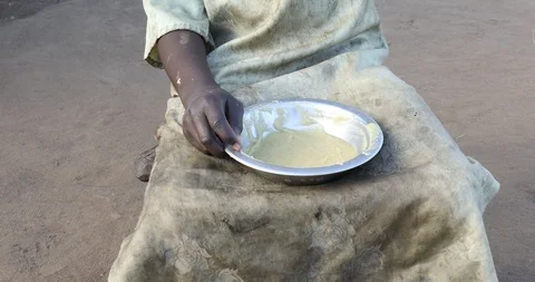 Refugee Girl Eats Breakfast Stock Footage 93917512