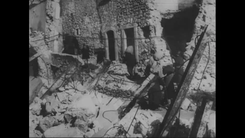 Refugees and displaced persons move through ruins and over the river - 1946 Stock Footage 99783590