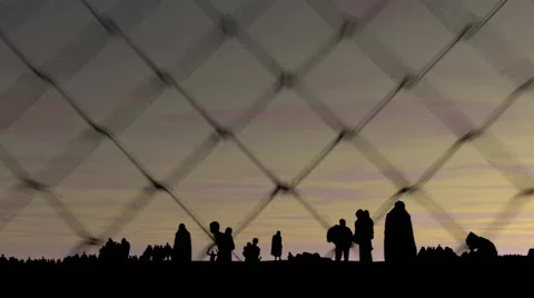 Refugees behind barbed wire Stock Footage 64155234