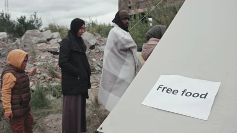 Refugees Standing in Queue for Free Food Stock Footage 162717851