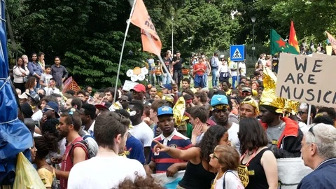Refugees take part to demonstration in Milan, Italy 動画素材 76080006