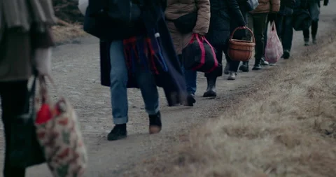 Refugees Walking On Road While Migrating During War. Stock Footage 180499399