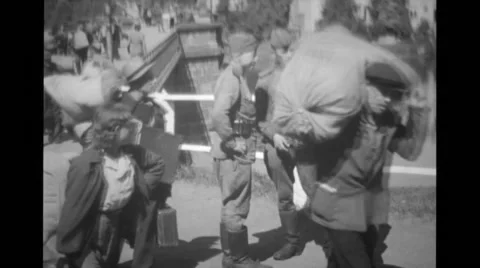 Refugees walking with sacks Stock Footage 39908323