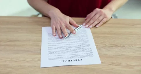Refusal of contract and businesswoman refuses to sign contract at table Stock Footage 260598853