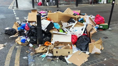 Refuse waste not collected due to a council bin service strike. London, UK. Video stock 251560382