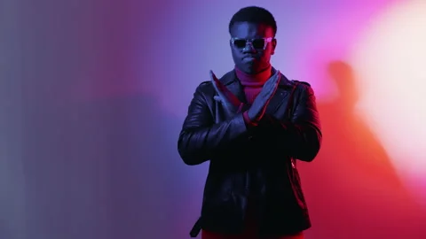 Refusing man stop gesture crossed hands ban neon Stock Footage 196870536